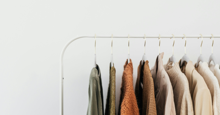 Clothes rack with clothing hanging